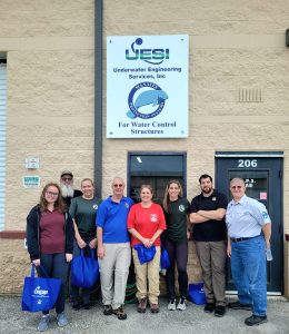 US Fish and Wildlife Service Tour of MPS Labs at UESI, group smiling