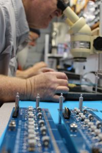 Larry Taylor in the MPS Lab with Microscope